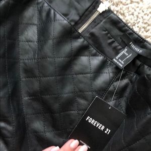 Forever 21 Skirts - NWT black leather skirt size Large Forever 21 Skirts - NWT black leather skirt size Large